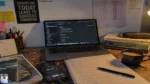 15 Best Apps for Studying (Free & Paid) — Tested and Ranked A real student study setup with a laptop showing study notes, a smartphone tracking focus time, and an open notebook.