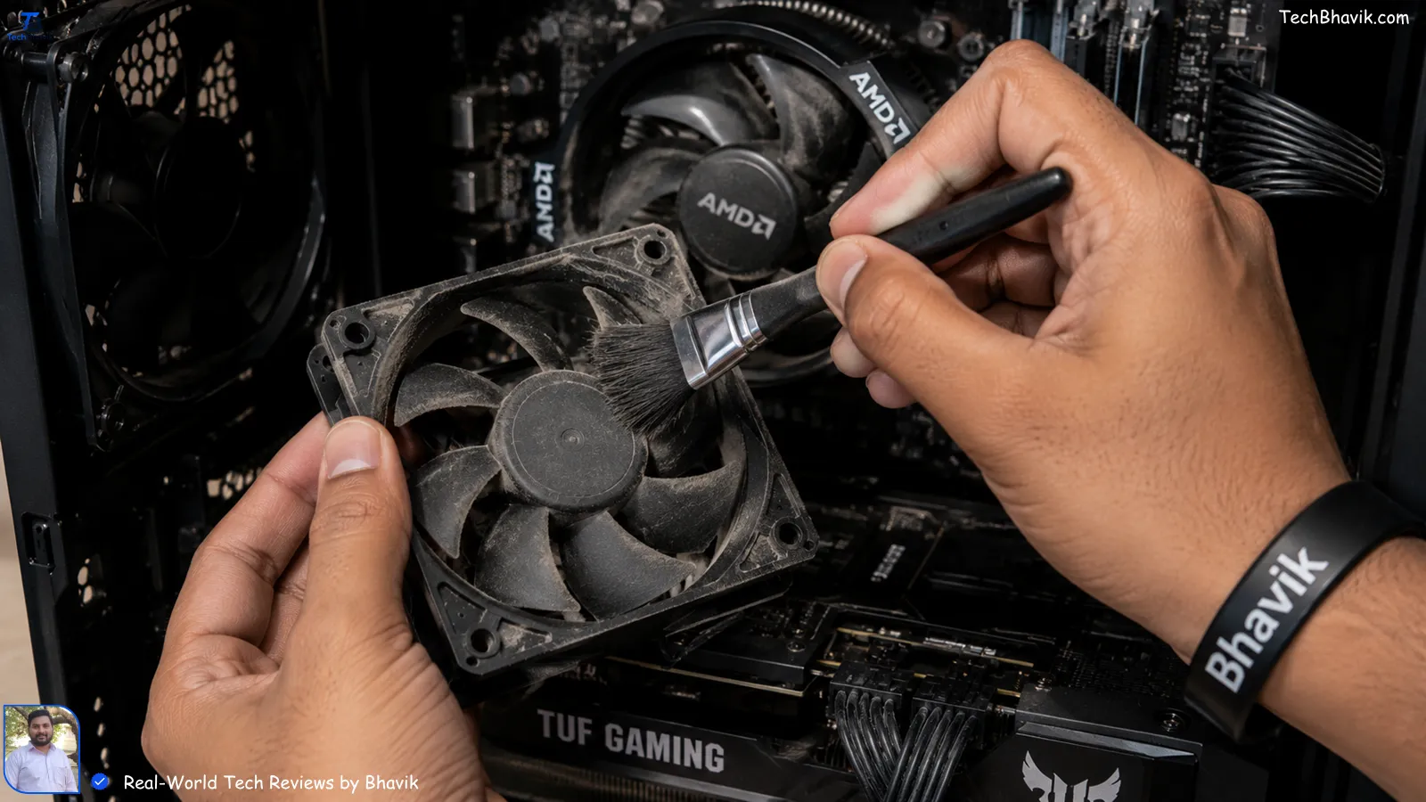 Using a small brush to clean dust from a computer fan to prevent overheating