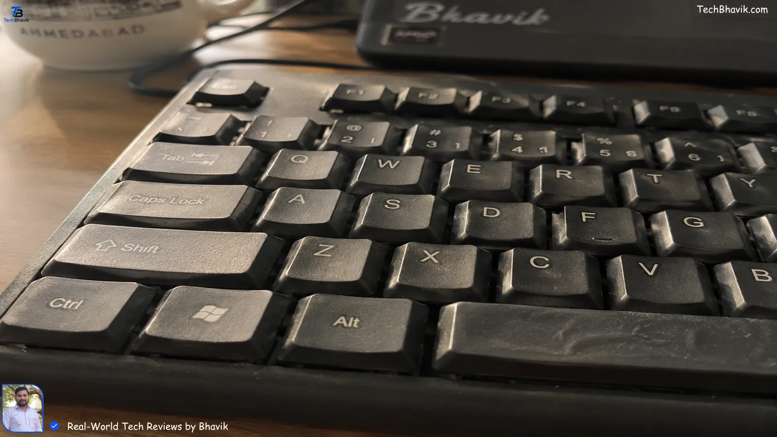 I Tested 27 Budget Keyboard Mouse Combos—Here Are the Only 5 Worth Your Money Close-up of budget keyboard keys slightly warped from Gujarat summer heat on Bhavik’s desk