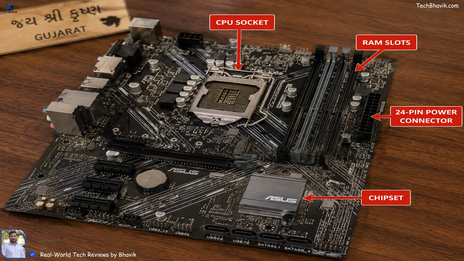Parts of a Computer Explained: CPU, GPU, SSD 2026 Close-up of a motherboard on a table in Gujarat with CPU socket, RAM slots, chipset, and power connector marked with red arrows parts of a computer