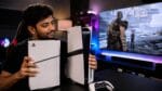 Author testing PS5 Pro console with PSSR and ray tracing in gaming setup