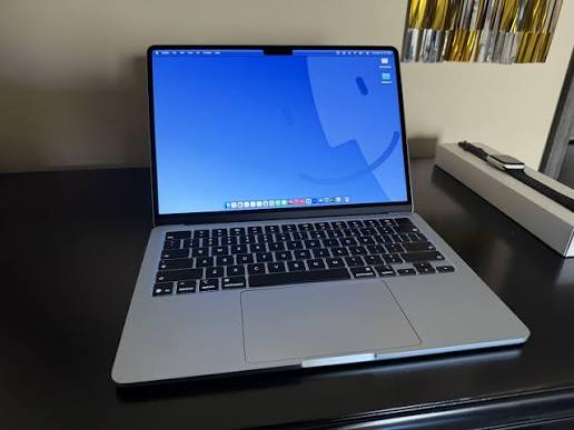 [Image: macbook-air-m5-ports-and-keyboard.jpg | Alt: MacBook Air M5 keyboard and ports close-up]
[Image: student-using-macbook-neo-in-library.jpg | Alt: Indian student using MacBook Neo in college library]
[Image: macbook-air-m5-sky-blue-lifestyle.jpg | Alt: MacBook Air M5 Sky Blue color on office table]
[Image: macbook-neo-battery-test-real-world.jpg | Alt: MacBook Neo battery life test on desk with low battery indicator]